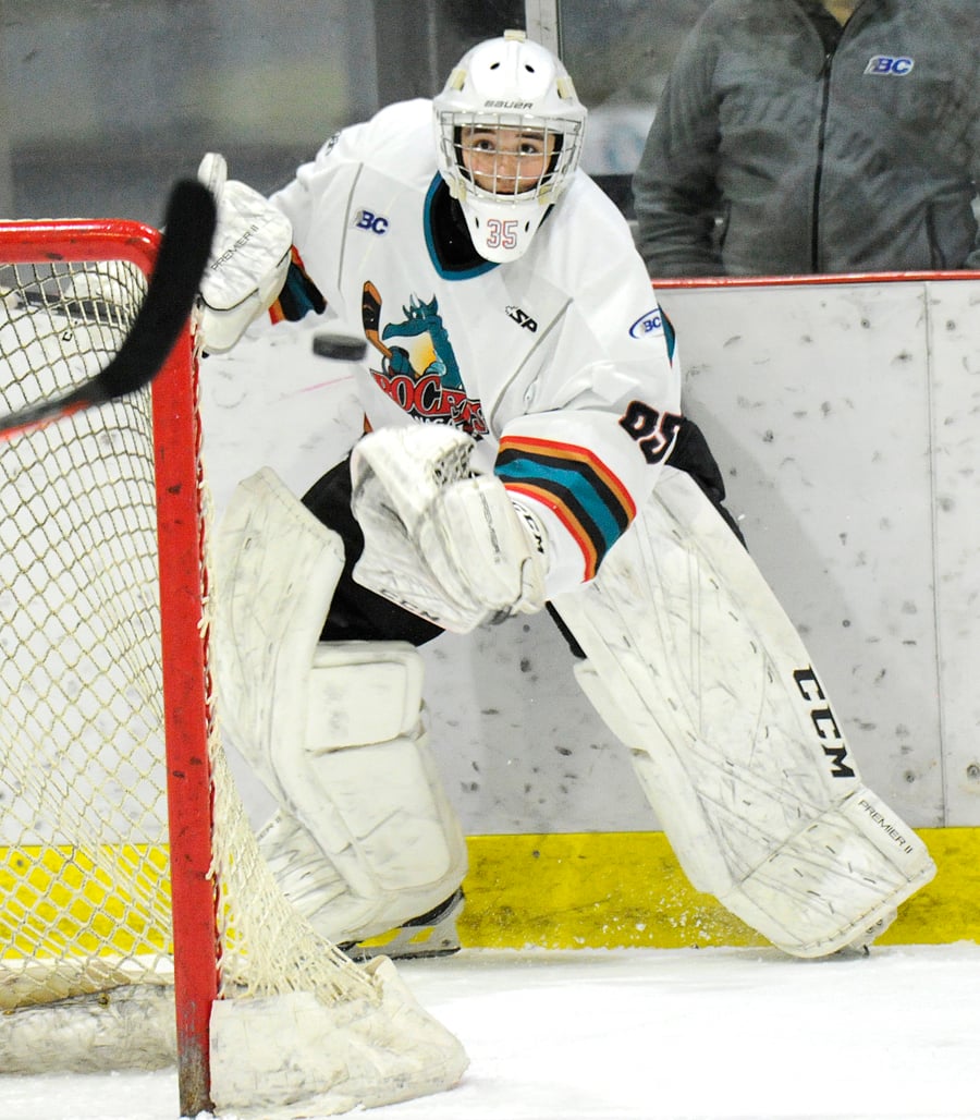 <who>Photo Credit: Lorne White/KelownaNow </who>Bailey Monteith clears the puck from behind his net during the Okanagan Rockets' 4-3 overtime win over the Valley West Giants. He and goaltending partner Cayden Hamming are both 5-0 to start the seaon.