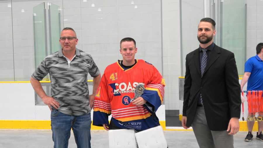 <who> Photo Credit: Contributed </who> Chris Harris poses with his MVP award.