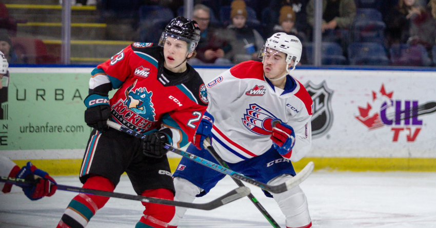 <who> Photo Credit: Steve Dunsmoor </who> Andrew Cristall battles with Chiefs defenceman Mac Gross in November action between the two clubs.