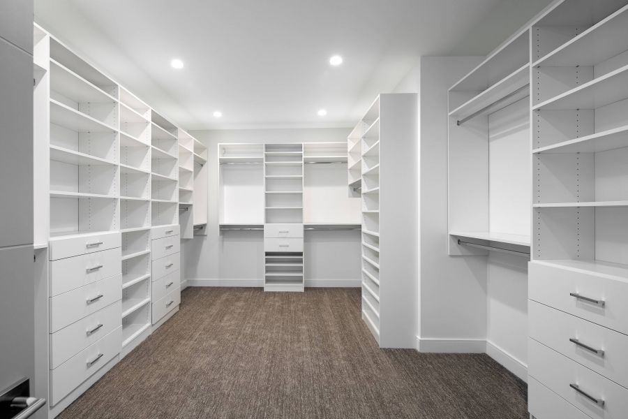 <who>Photo credit: Contributed</who>3253 - 5576 Upper Mission Drive - This master closet is what dreams are made of! Think about all the shopping you can do to fill it up.