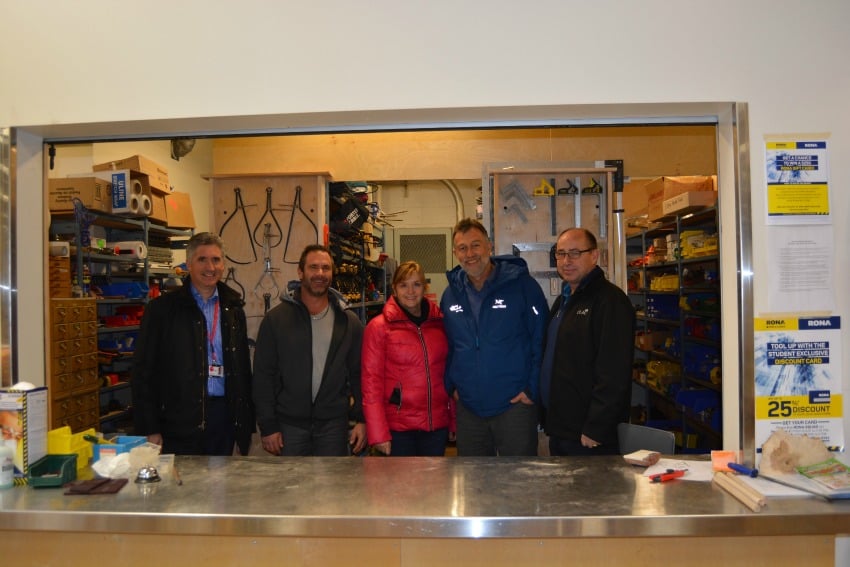 <who> Photo Credit: Okanagan College </who> the group in the tool crib supported by CLAC’s donation to Okanagan College’s updated carpentry shop.