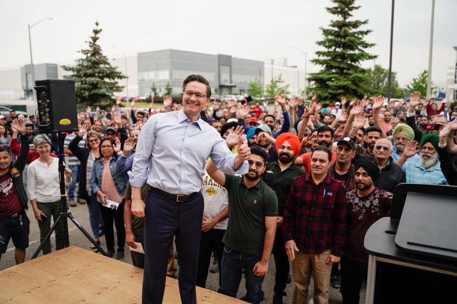 <who>Photo Credit: Facebook</who>Pierre Poilievre at an event in Ontario in June.