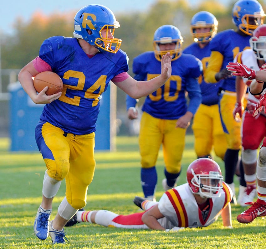 Chase Schumacher of the Rutland Voodoos leaves a Mouat defender in his wake on a run for a long gain.