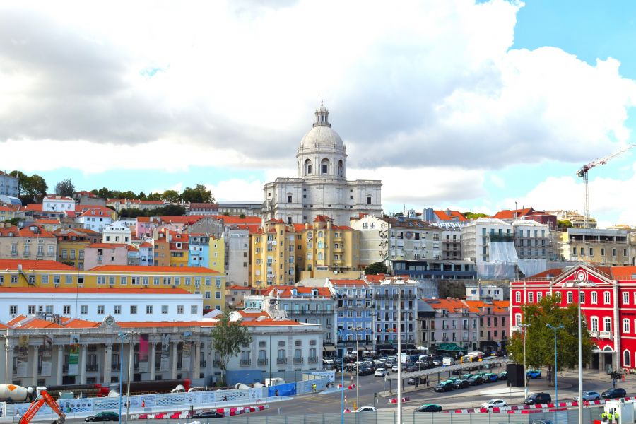 </who> Lisbon’s historic narrow streets and alleys are ideal for motorcycle sidecar touring. This photo of the city's skyline is dominated by the National Pantheon.