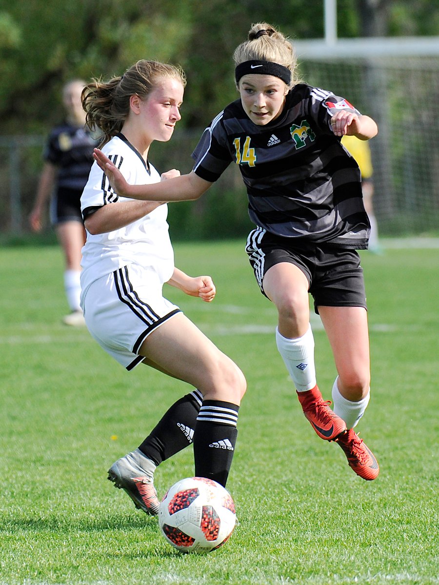 Anna Hopley of Immaculata sidesteps an opponent.