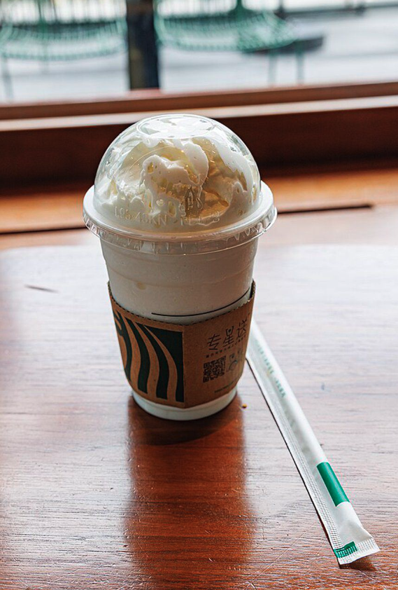 <who> Photo credit: Wikimedia Commons </who> Starbucks’ Grande Caramel Ribbon Crunch Frappuccino contains 470 calories, 22g of fat, and 60g of sugar (14 teaspoons), while at McDonald’s their medium Mocha Frappe contains 490 calories, 20g of fat, and 60g of sugar (14 teaspoons). Tim Hortons medium Mocha Iced Capp contains 530 calories, 24g of fat and 72g of sugar (17 teaspoons). Pictured is a Starbucks Frappuccino.