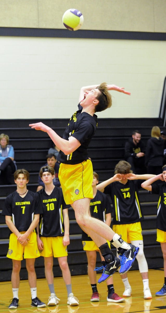 Max McDonald serving against the Huskies in the Owls' 3-0 win in the Valley title match.