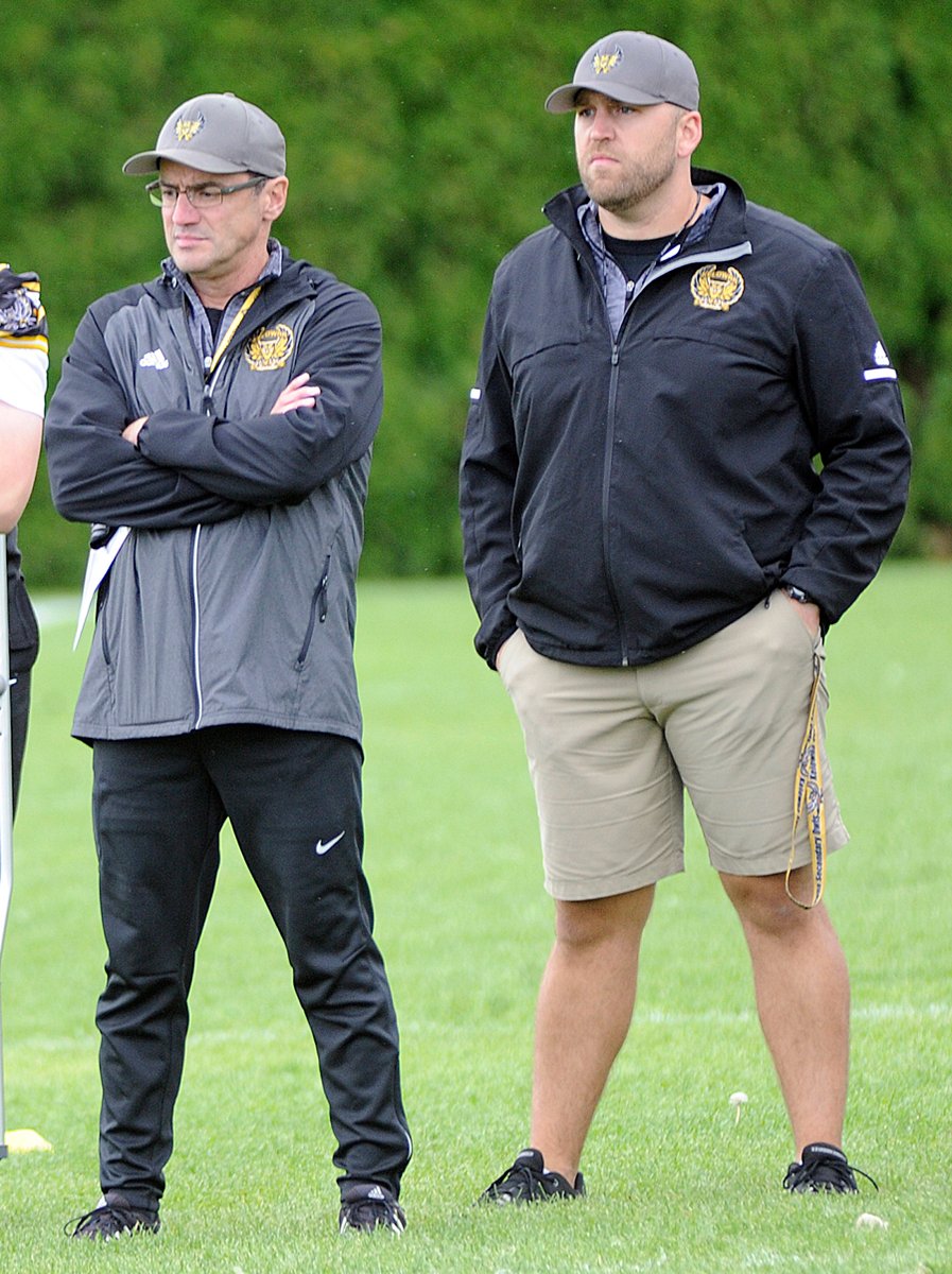 <who>Photo Credit: Lorne White/KelownaNow </who>Kendall Gross, left, and Chris Cartwright are the junior and senior head coaches respectively.