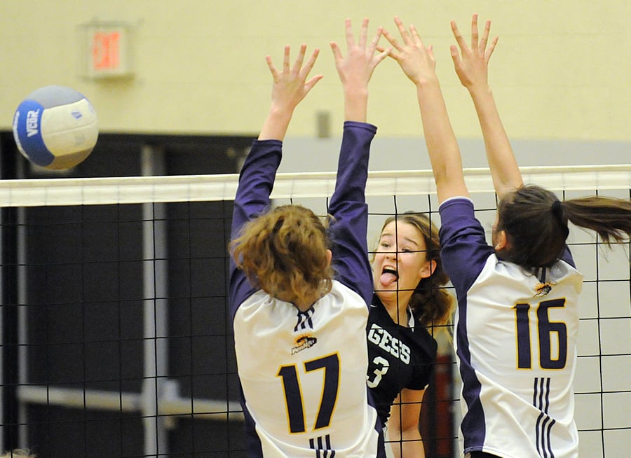 <who>Photo Credit: Lorne White/KelownaNow </who>Tess Evans came through with 11 kills and 15 digs for the Elliot Coyotes against Kalamalka.