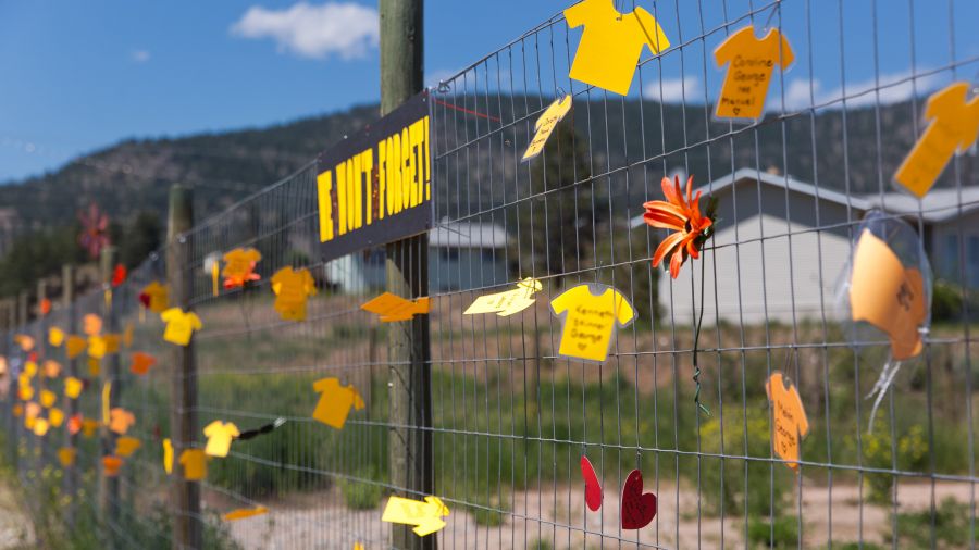 <who>Photo Credit: NowMedia</who> Crystal Gabriel's property fence is now a residential school survivor memorial