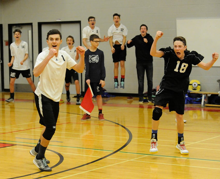 <who>Photo Credit: Lorne White/KelownaNow </who>The George Elliot Coyotes celebrate a point late in their semifinal match against the MEI Eagles.