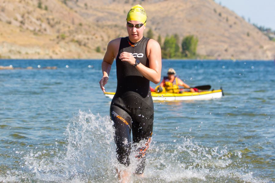 <who>Photo Credit: NowMedia</who> Issie Grecoff exiting the water at the 2022 Ultra Swim