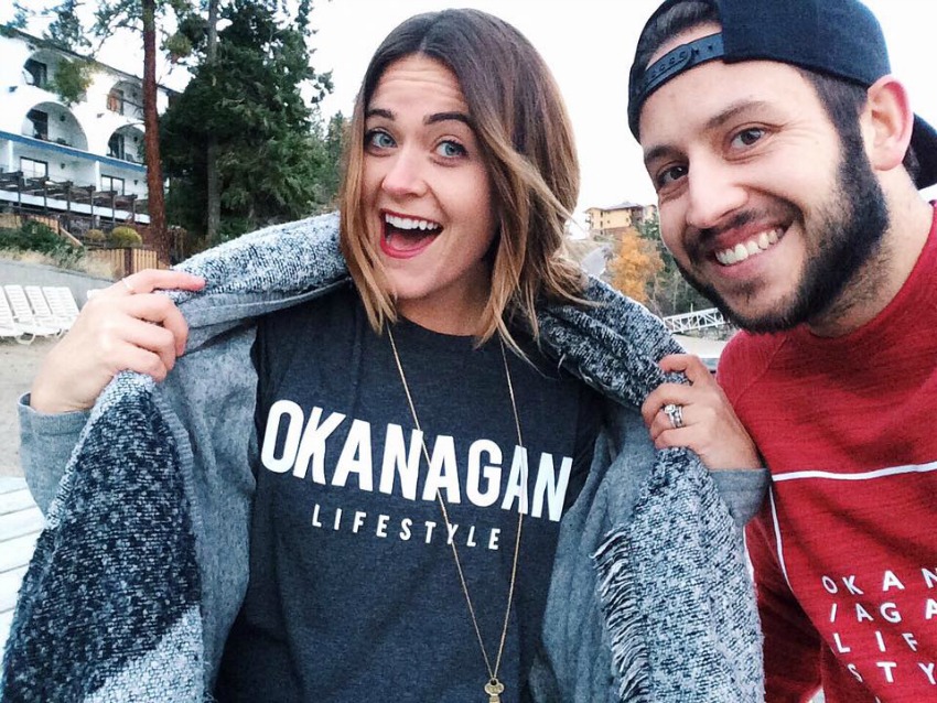 <who> Photo Credit: Okanagan Lifestyle on Facebook. </who> Jaclyn Roberton and Markuu Luopa, owners of Okanagan Lifestyle Apparrel. 