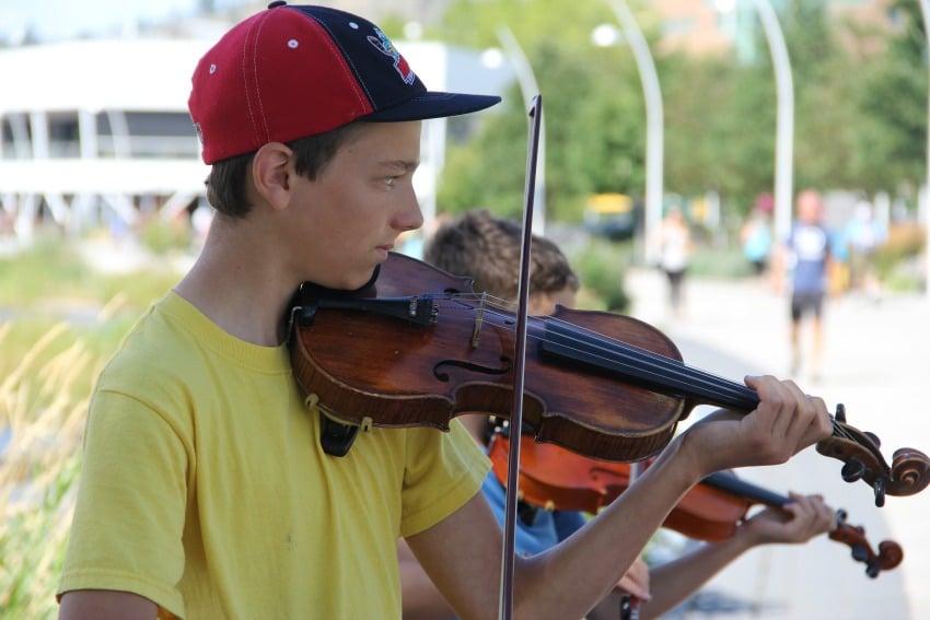 <who> Photo Credit: KelownaNow.com </who> Thirteen-year-old Joel Krasko has been playing the violin since he was three. 