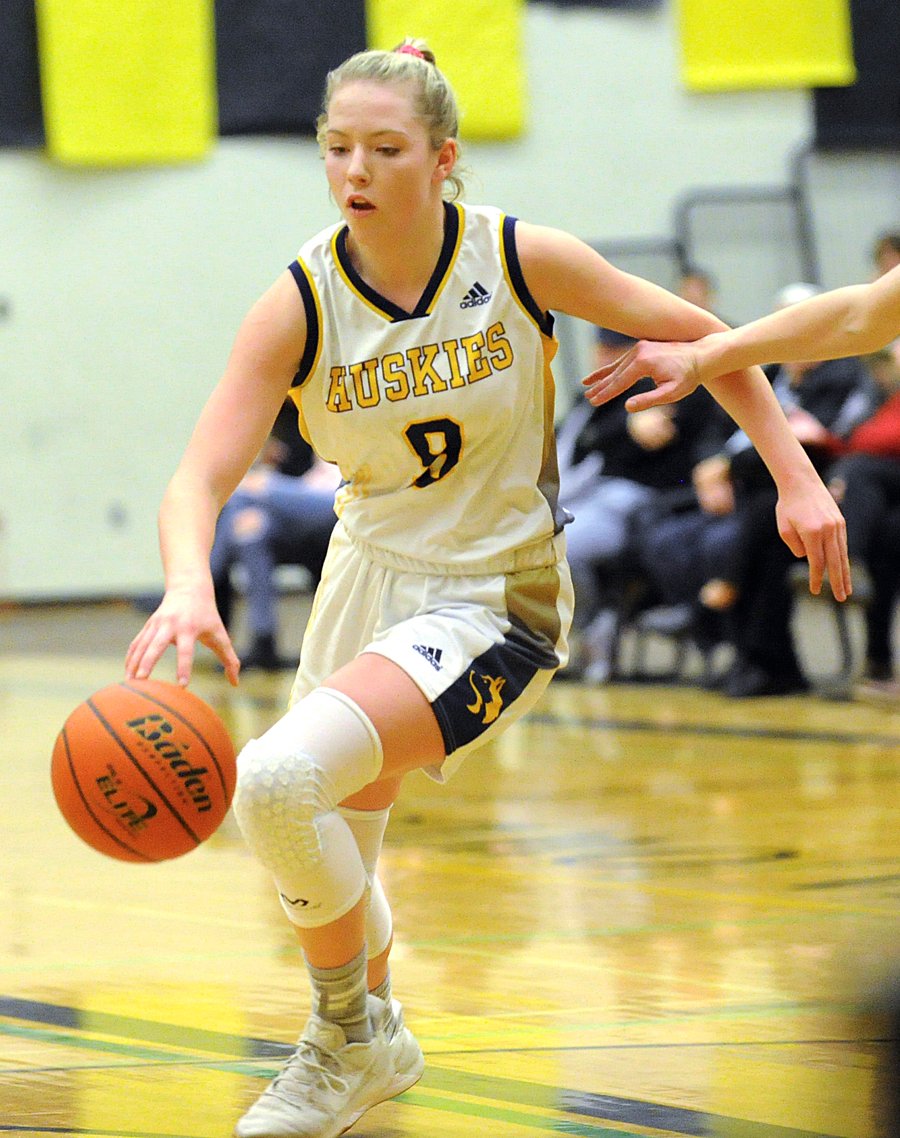 Lily Pink matched Corrado's performance to help lead the Huskies in their tournament opener.