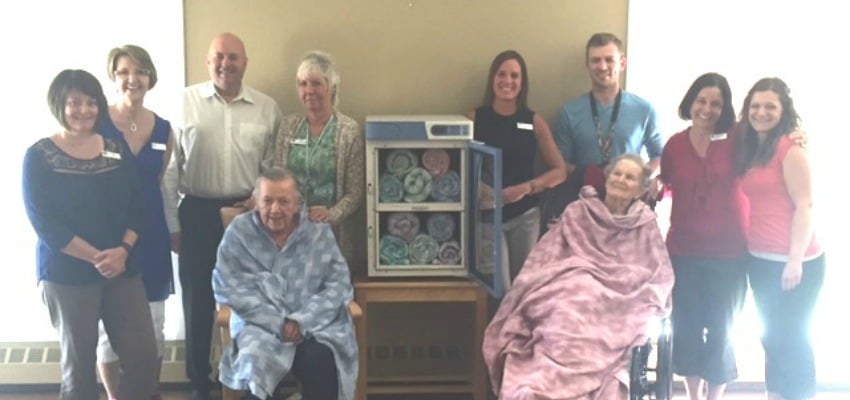  <who> Photo Credit: Baptist Housing . </who> From L to R: Trevor Pollon, Orchard Ford with Village at Smith Creek Team Members and Residents.