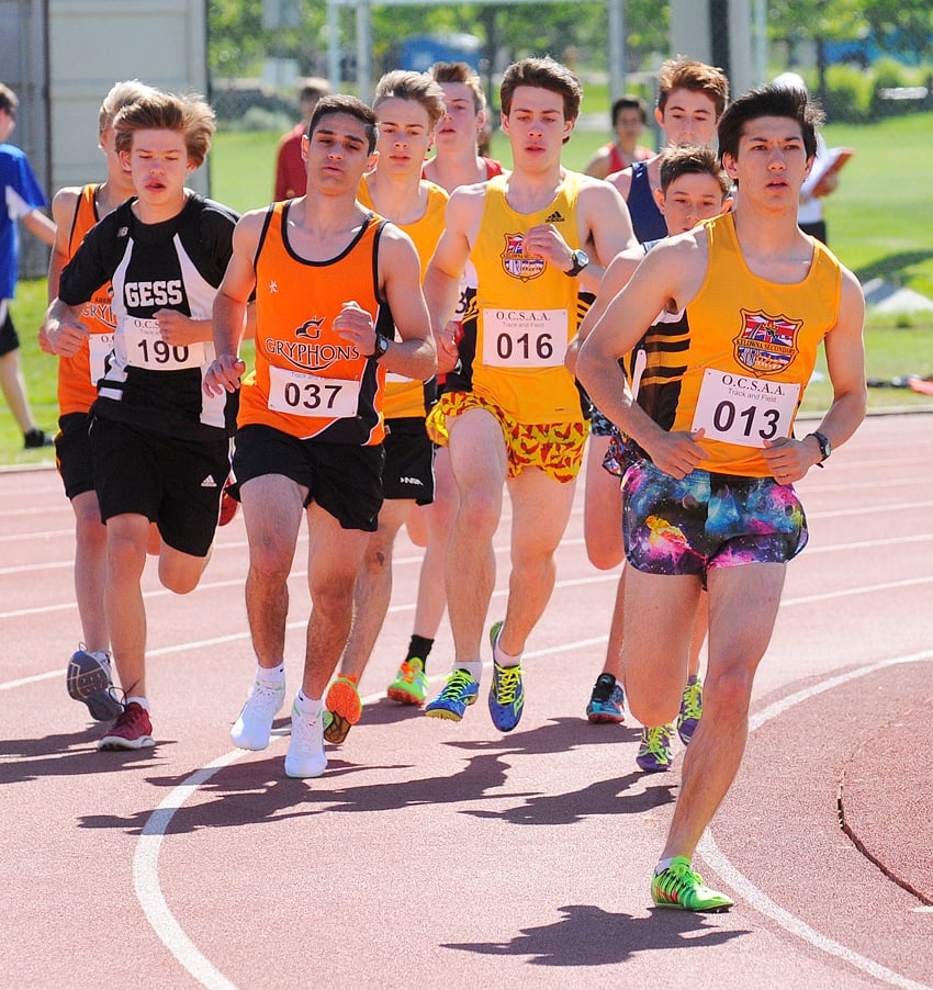 <who>Photo Credit: Lorne White/KelownaNow </who>Sean Bergman of the Kelowna Owls, right, led the 3,000-metre race from start to finish