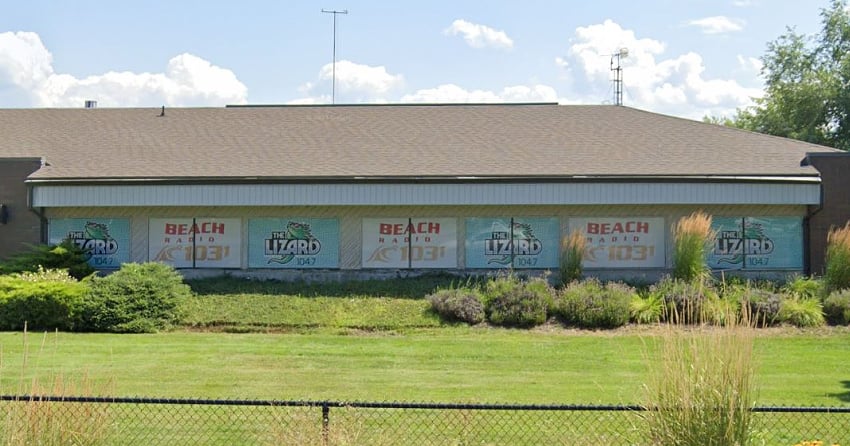<who>Photo Credit: Google Streetview</who>Pattison's radio station headquarters in Kelowna at the corner of Lakeshore and Cook.