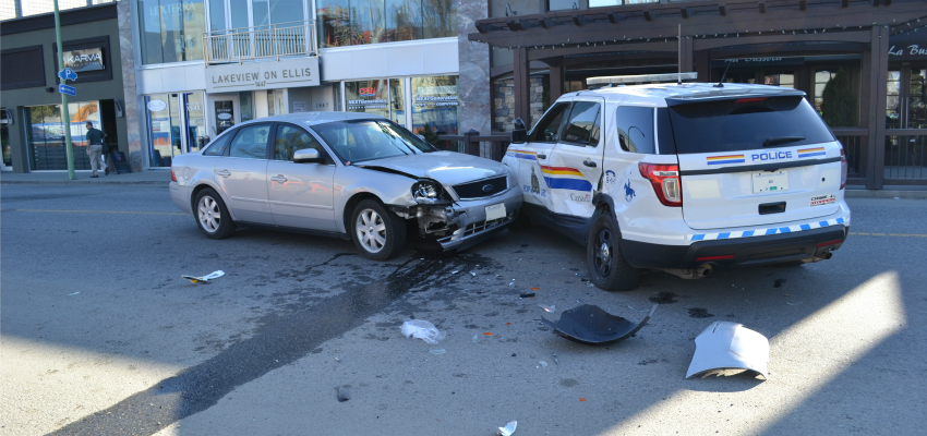 <who> Photo Credit: Kelowna RCMP. </who> The scene of the crash and alleged assault in Kelowna on April 1. 