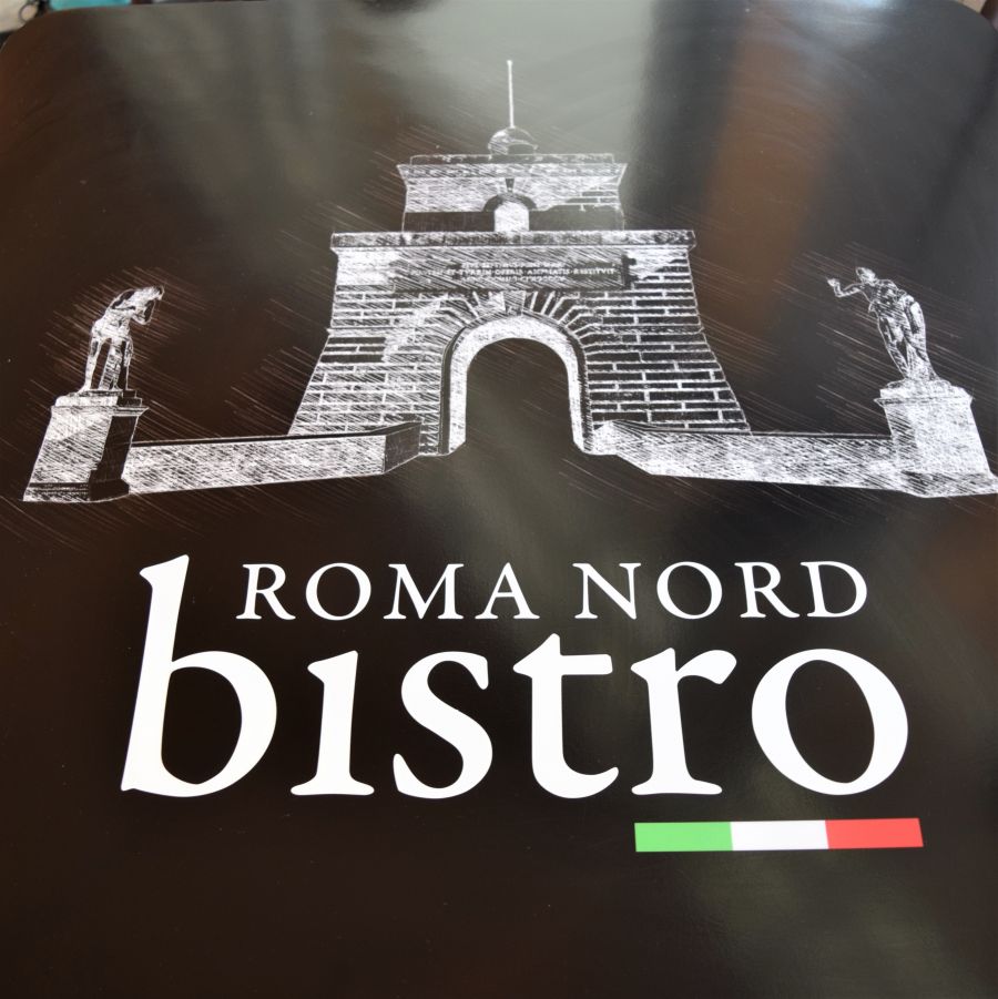 </who>The table tops at Roma Nord Bistro.
