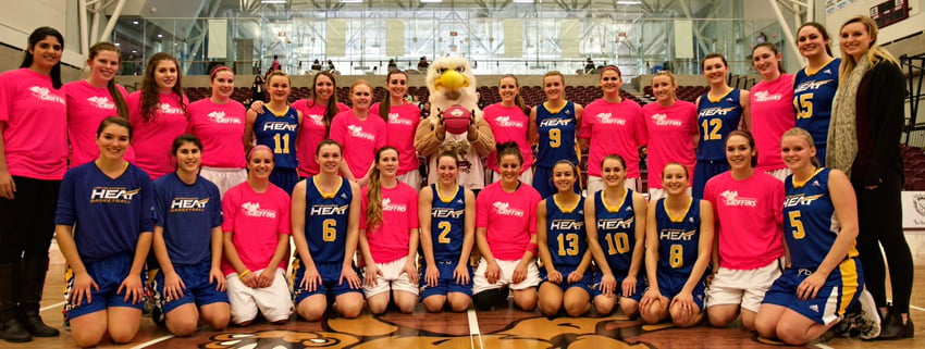 <who>Photo Credit: Len Joudrey Photo </who>The Okanagan Heat and MacEwan Griffins gather before a weekend game in Edmonton as part of the ninth annual CIS Shoot For The Cure campaign. All proceeds from Friday's game were donated by the school to the foundation.