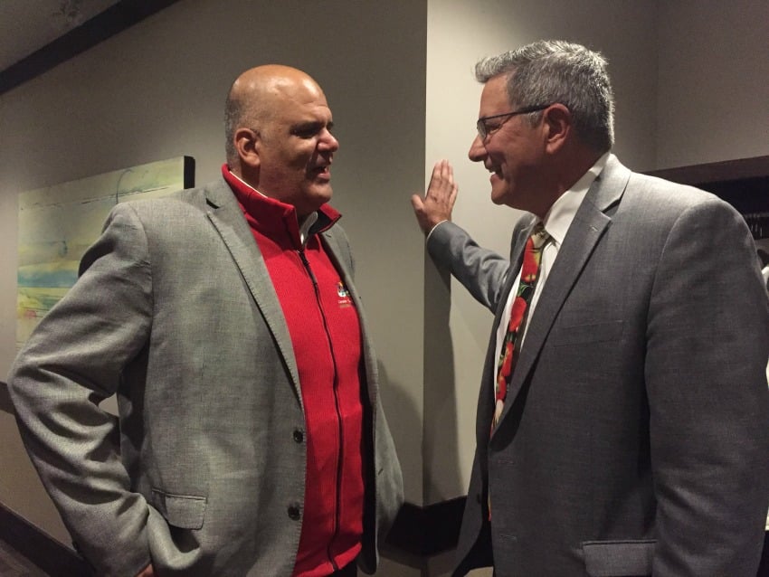 <who> Photo credit: KamloopsBCNow</who> Councillor (and acting mayor) Arjun Singh and newly elected mayor Ken Christian.