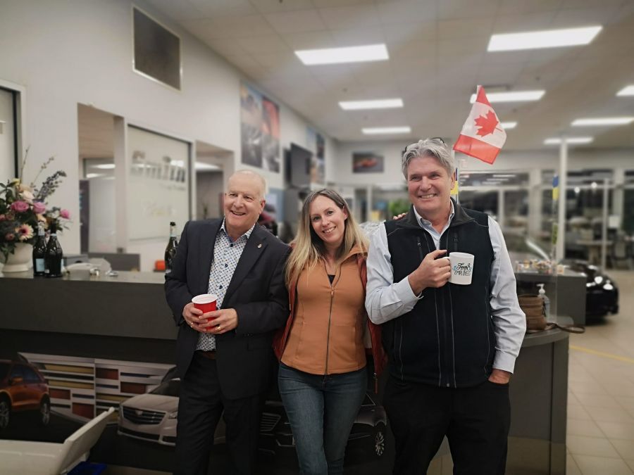 <who>Photo Credit: Jaimie Gunn</who>Anthony Muzzillo (L) and Michael Schreiner (R) with Smith Chevrolet Cadillac team member Jaimie Gunn.