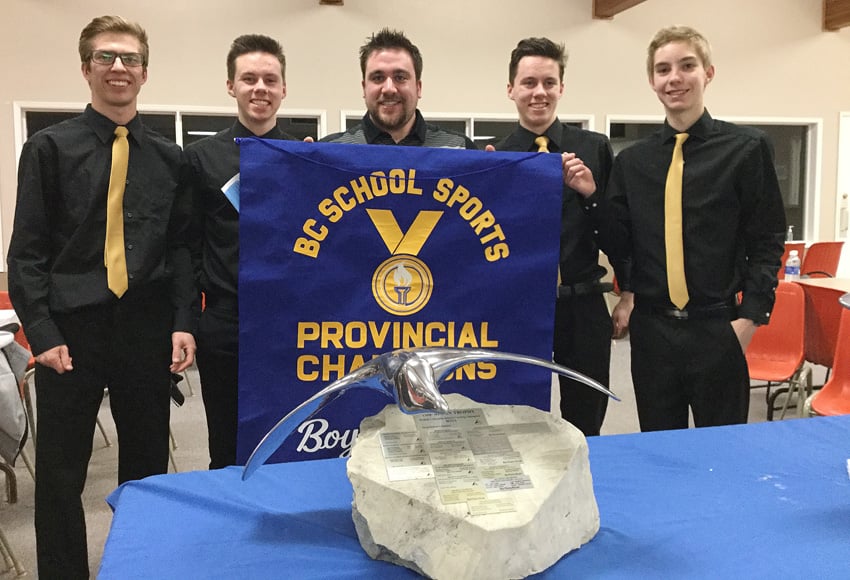 <who>Photo Credit: Contributed </who>The Kelowna Owls won six of seven games on the way to a B.C. School Sports curling championship in Smithers on the weekend. Members of the team are from left, Logan Miron (skip), Ewan Murray (third), Justin Nillson (coach), Ramsay Murray (second) and Bryan Cresswell (lead). The Kelowna Secondary School foursome brought home the BCSS banner, but had to leave the 45 kg granite-based trophy behind due to the lack of space in their vehicle for the the 12-hour road trip home. The trophy will be transported to Kelowna by bus at a later date.