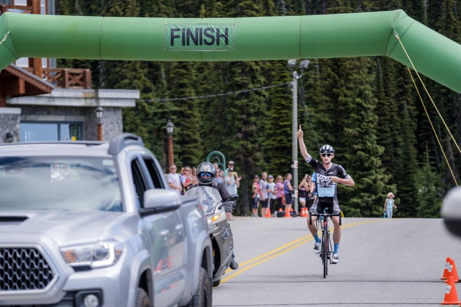 Tim Savre crossing the finish line