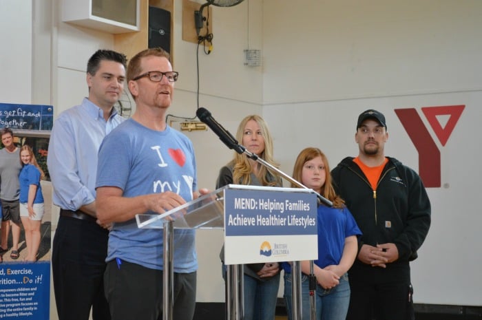 <who> Photo Credit: KamloopsBCNow </who> Health Minister Terry Lake announces $2 million increase to the MEND program at the YMCA in Kamloops Tuesday morning.