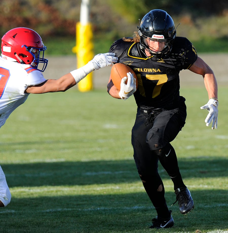 <who>Photo Credit: Lorne White/KelownaNow </who>The Owls' Nolan Ulm caught two touchdown passes and accumulated 88 yards against Terry Fox.