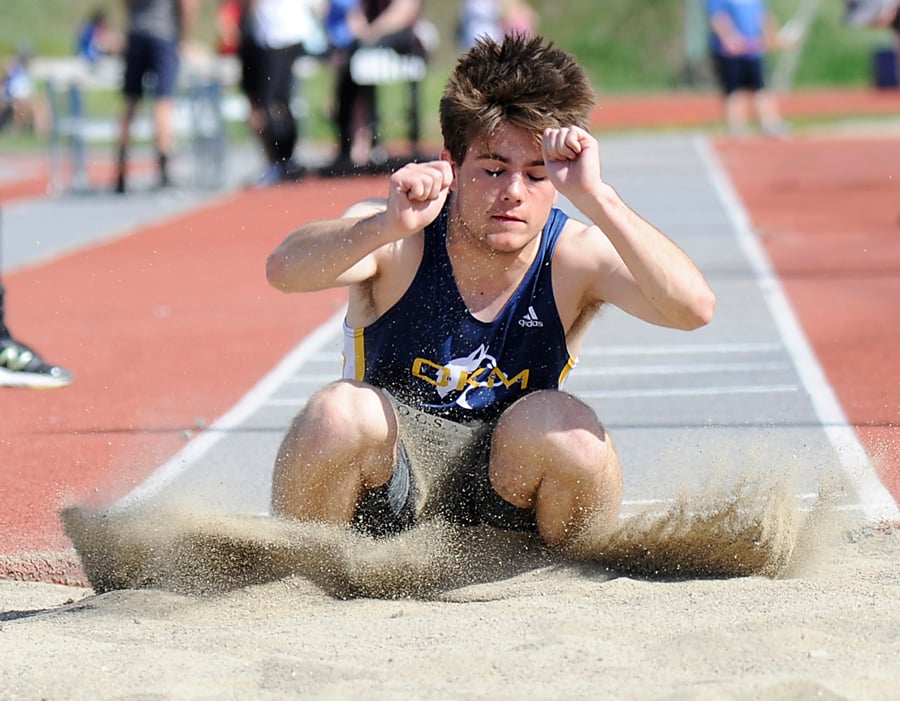 <who>Photo Credit: Lorne White/KelownaNow </who>A winner in both the junior boys' long jump and triple jump, OKM's Camden Elkin also finished second in the discus to earn his team 28 points.