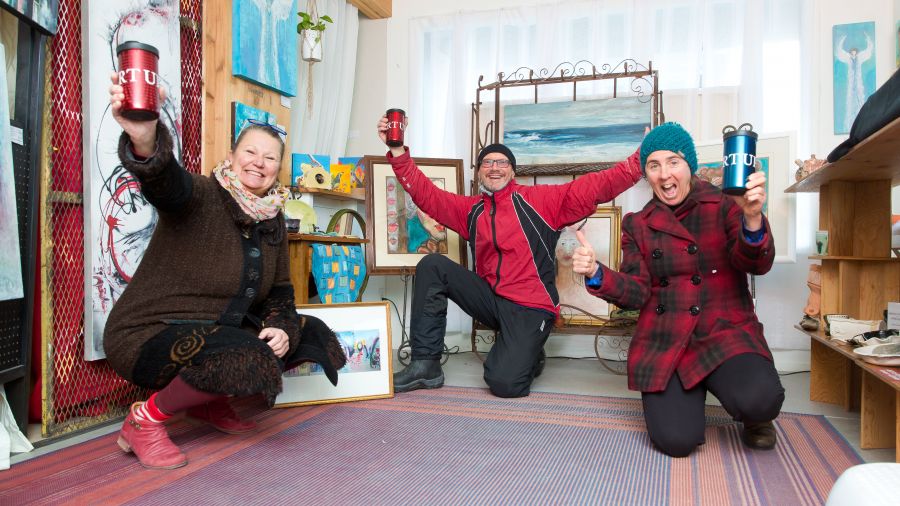 <who>Photo Credit: NowMedia</who> Derrie Selles, Richard Walter, and Meredith Essler raise their cups at Art Up Studios