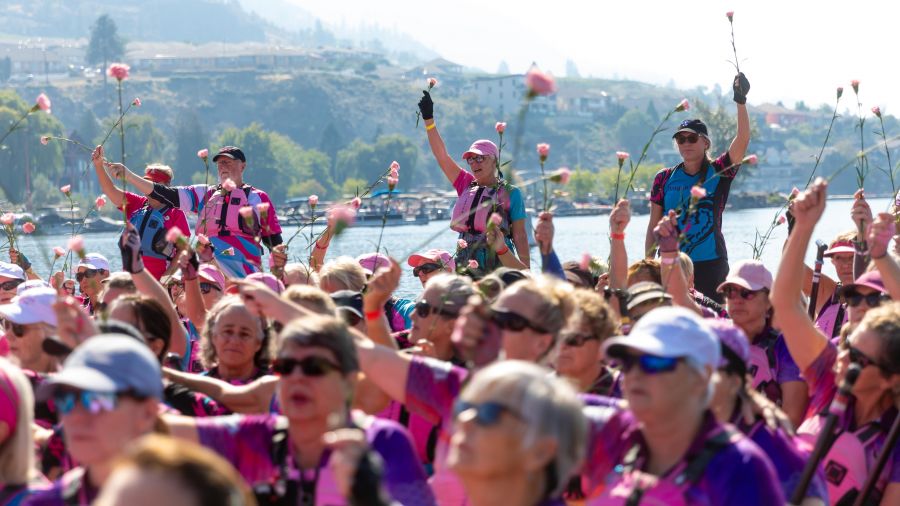 <who>Photo Credit: NowMedia/Gord Goble</who> Carnations are held aloft during ceremony