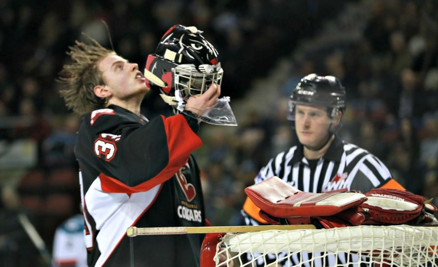 <who>Photo Credit: KelownaNow</who>Nick McBride whips his hair back and forth.