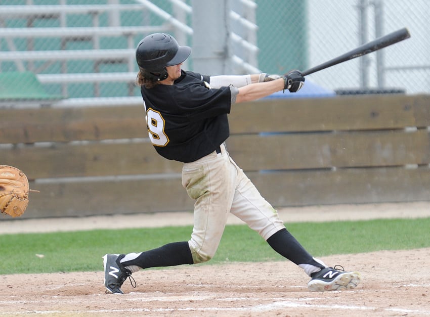 <who>Photo Credit: Lorne White/KelownaNow </who>Kade Kozak of the A's, hitting at a .351 pace, connects for line drive in the weekend opener.