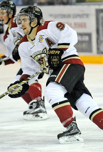 <who>Photo Credit: Lorne White/KelownaNow.com </who>Brett Mennear scored twice and assisted on a goal.