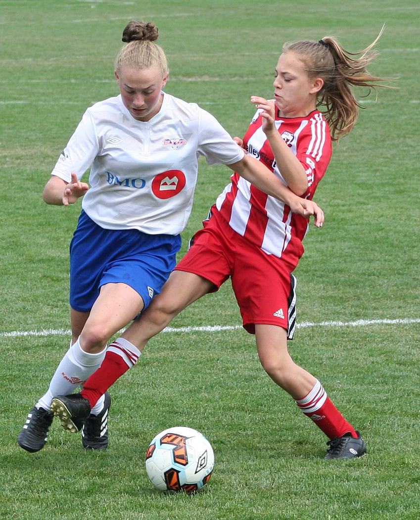 <who>Photo Credit: Contributed </who>Taylor Luch, right, of the Kelowna United U15s battle for possession against the Kamloops Blaze.