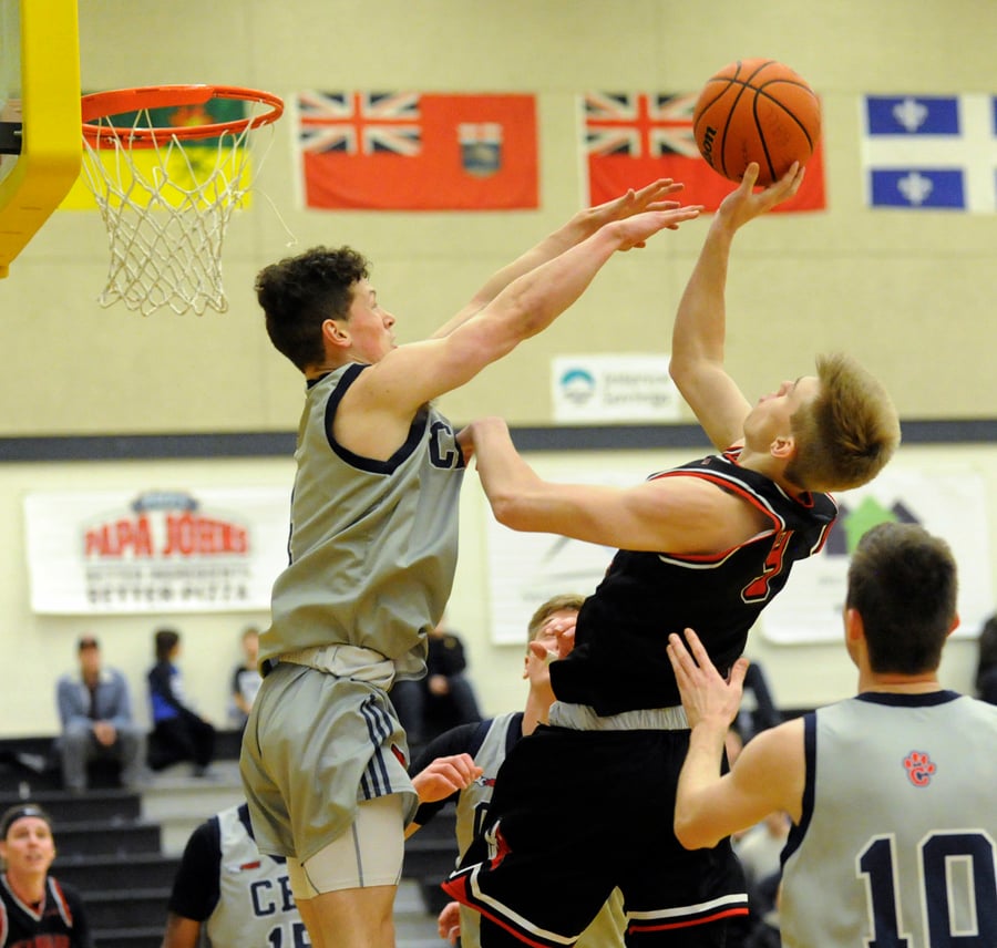 <who>Photo Credit: Lorne White/KelownaNow </who>Trajan Boyd of the OC Coyotes connected for three treys in Friday's win over CBC.