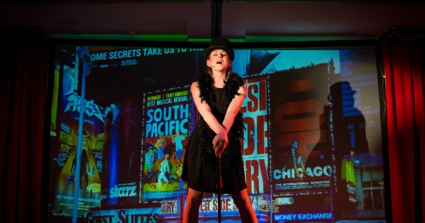 <who> Photo credit: Caroline Slade Photography</who> Stephanie Arsenault performing at last year's Mayor's Gala.