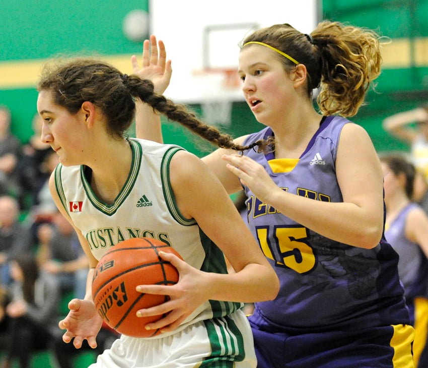 <who>Photo Credit: Lorne White/KelownaNow </who>Nicole Hart, left, played three senior seasons with the Immaculata Mustangs, helping them to two provincial championships.