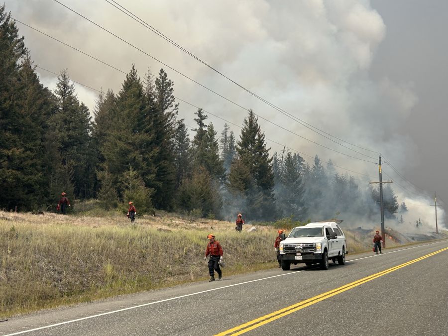 <who>Photo Credit: BC Wildfire Service</who>BC Wildfire Service crews work along Hwy 97 in late July.