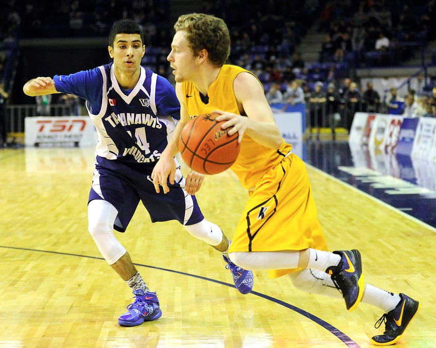 <who>Photo Credit: Lorne White/KelownaNow.com </who>Colin McGrath his five threes on the way to a 19-point championship game at the Langley Events Centre.