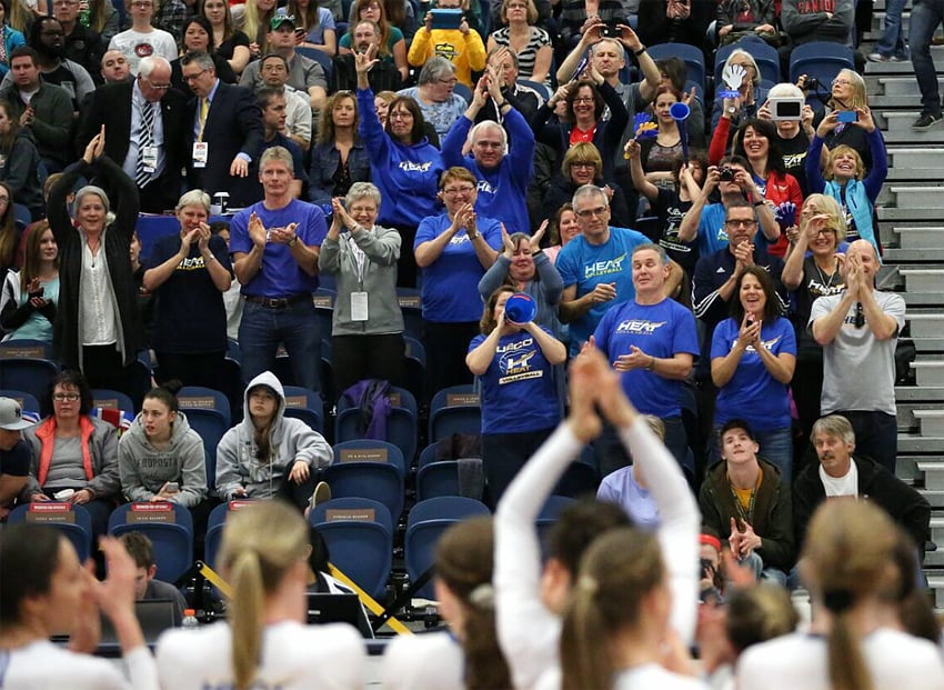 <who>Photo Credit: Heat Athletics </who>UBCO Heat fans and parents give standing ovation to the CIS national bronze medalists.