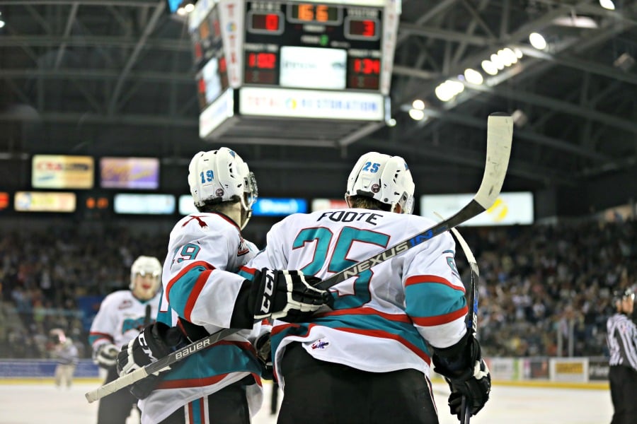 <who>Photo Credit: KelownaNow</who>Rookie Cal Foote opened the scoring for the Rockets by grinding his way to the front of the net.