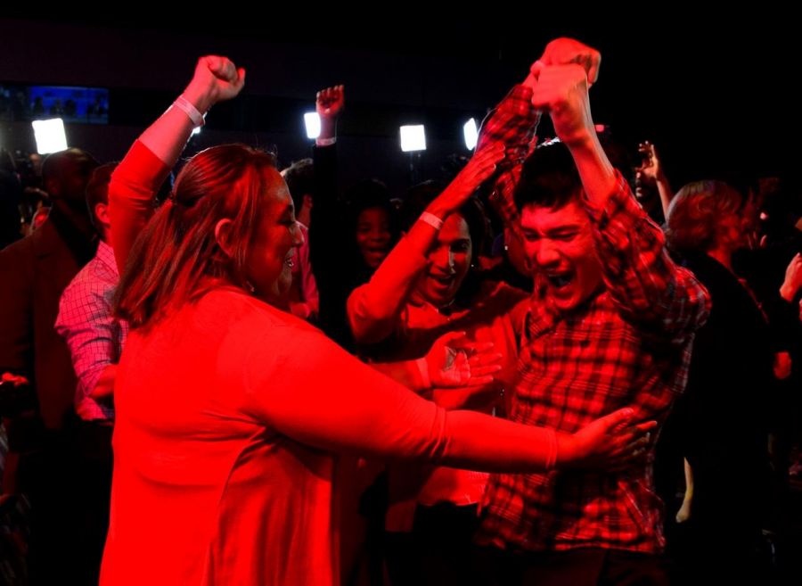 <who>Photo Credit: The Canadian Press</who>Liberal supporters celebrate on Monday night.