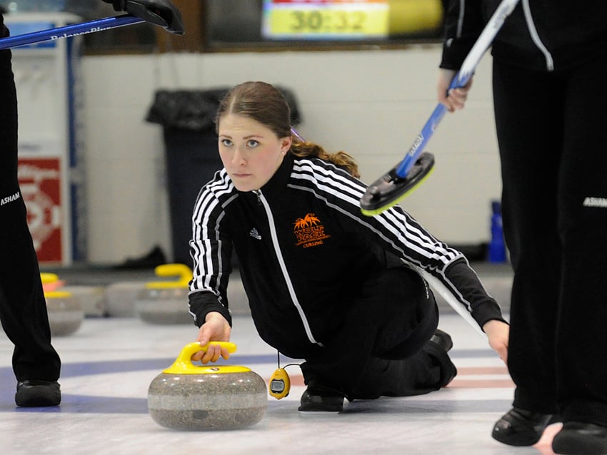 <who>Photo Credit: Lorne White/KelownaNow </who>Erin Pincott, third for the Thompson Rivers WolfPack, delivers against University of New Brunswick.