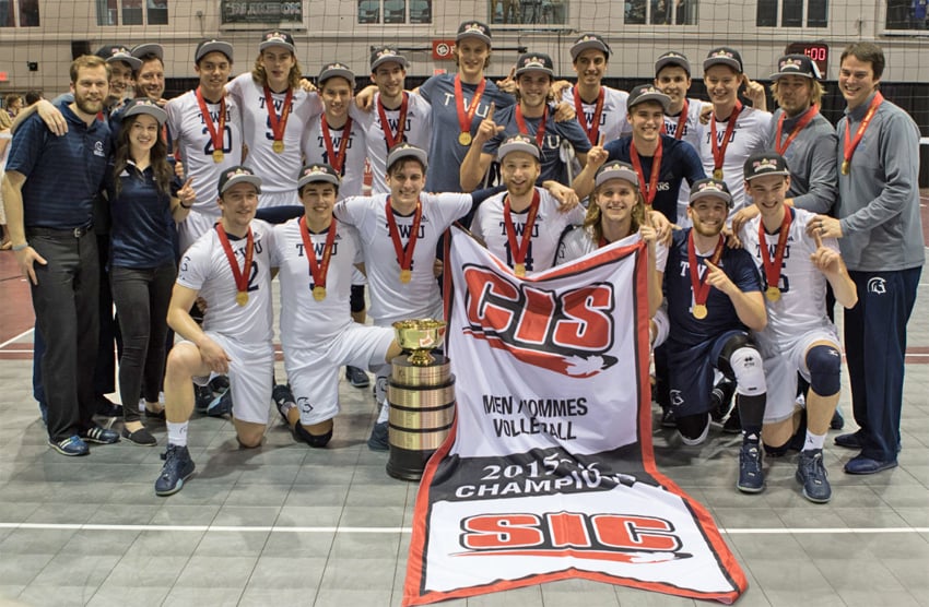 <who> Photo Credit: CIS </who>The Trinity Western University Spartans of Langley celebrate their CIS volleyball title in Hamilton. Included on the 2015-16 Cinderella team are, Scott Plocktis of West Kelowna (back, fourth from the right) and Kelowna's Leigh Goossen (seventh from left).