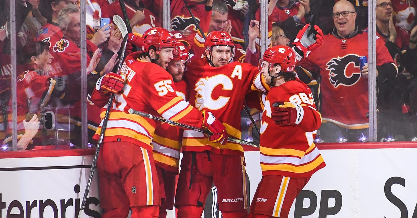 Flames win wild, high-scoring game 1 to draw first blood in Battle of ...
