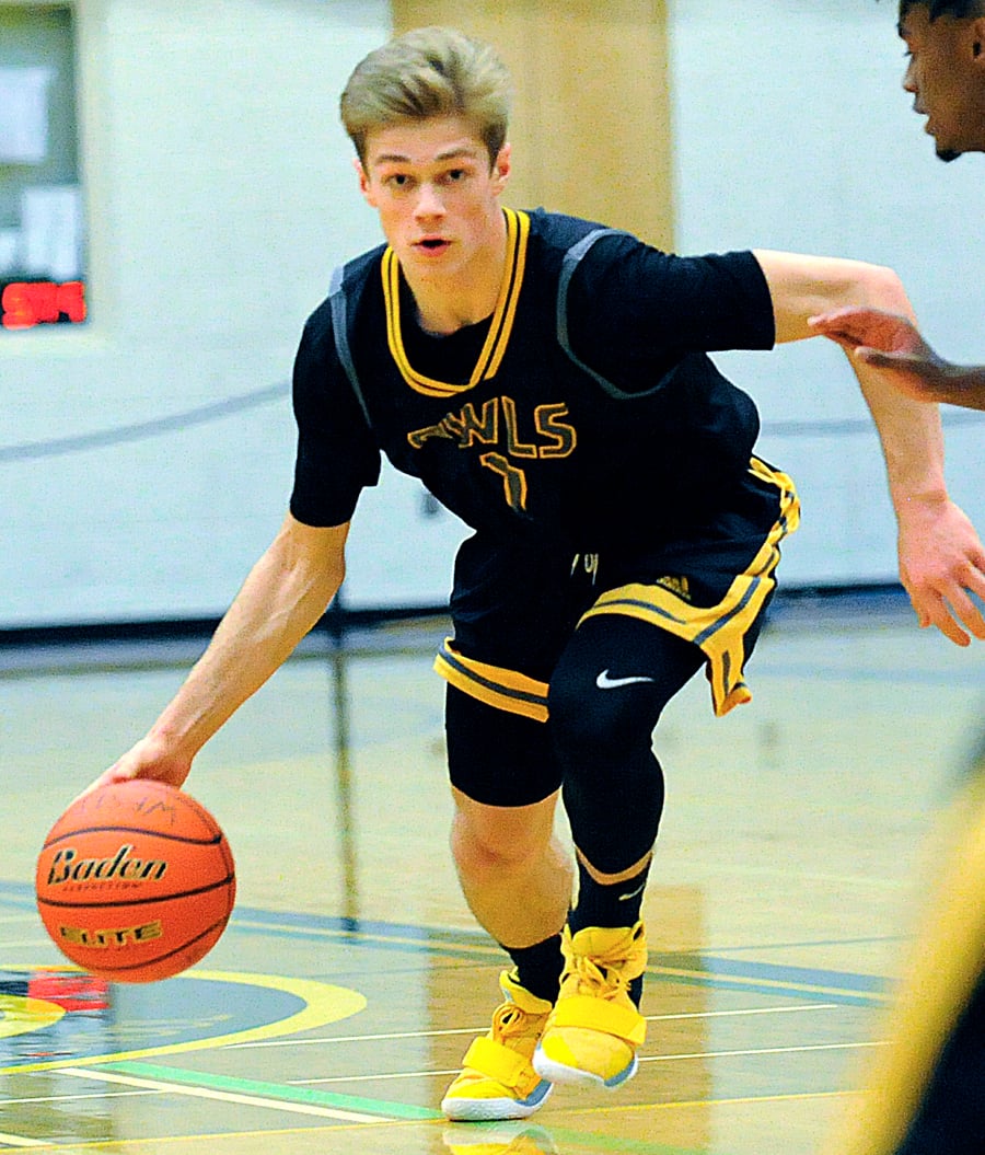 <who>Photo Credit: Lorne White/KelownaNow </who>Parker Johnstone's 23 points and seven rebounds led the Owls on opening day.